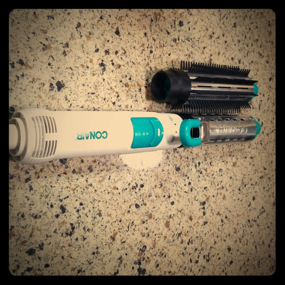 A conair blow dryer and curling duo